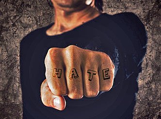 H-A-T-E Tattoo on Man's Fist